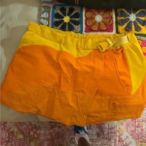 Outdoor Voices Orange and Yellow Cargo Skort
